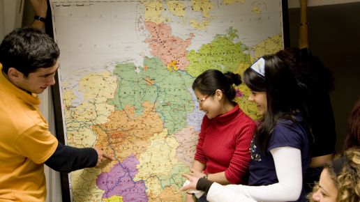 students searching on a map